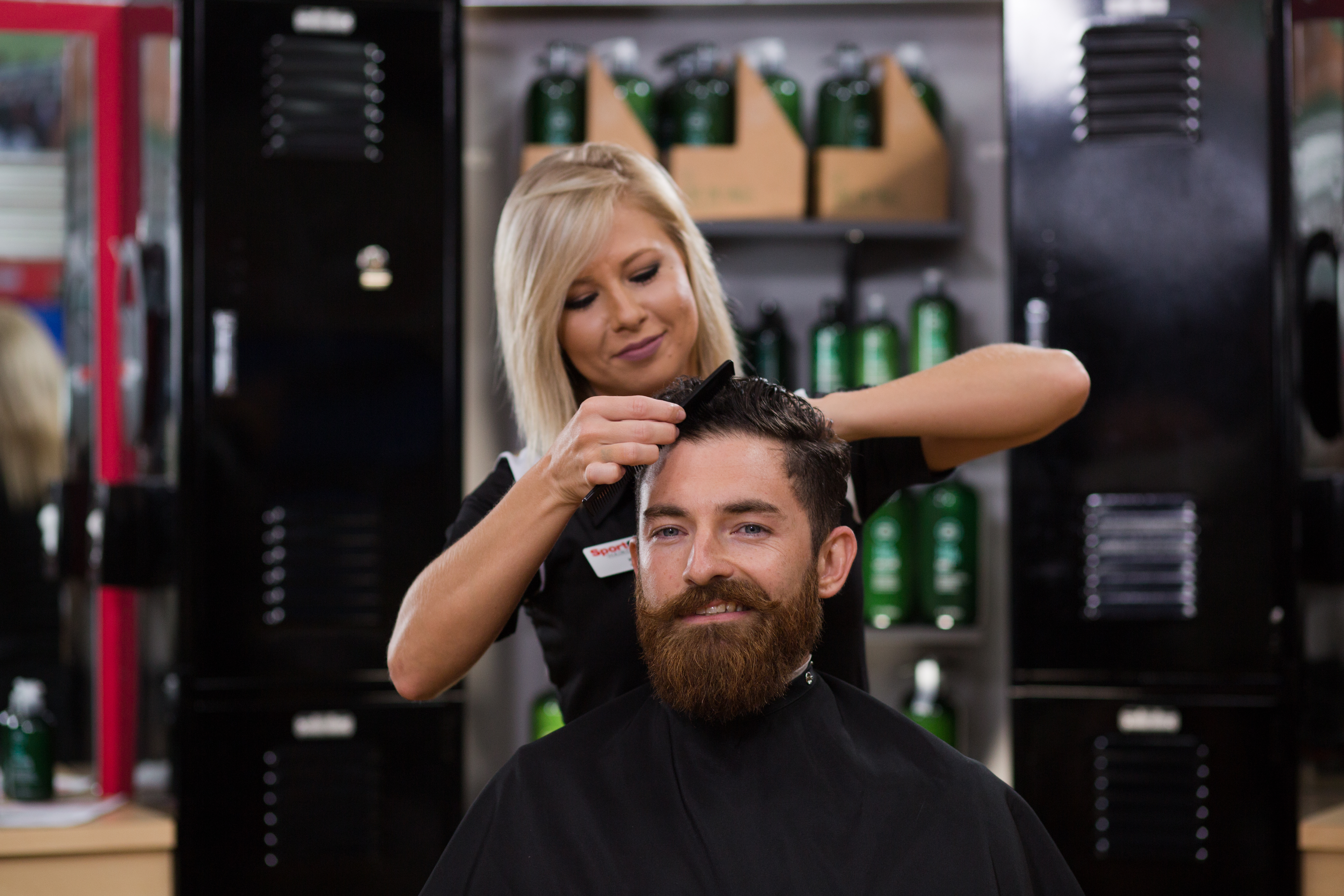 Man with beard getting a Sport Clips haircut