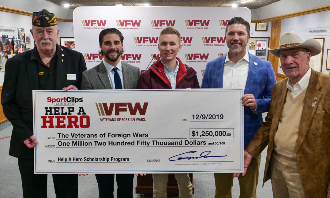 Sport Clips presents donation check to VFW Foundation